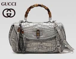 prada or gucci camera bag|difference between Gucci and Prada.